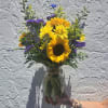 This bouquet was created for summer and summer only! Elegantly arranged, the