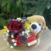 fresh flowers with rose in bowl with dog plush 