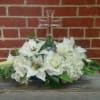 Beautiful Crystal Cross with silk flowers in whites and ivory's.  A