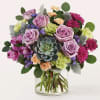 Ground yourself in the soothing hues of green and purple in the