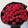 This bouquet is a stunning and luxurious arrangement of deep red garden