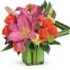 Cute, colorful and carefully curated, this artistic arrangement of hot pink lilies
