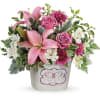 Sure to make mom&#039;s heart flutter, this sweet ceramic planter features a