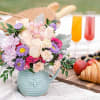 Peach roses, light pink alstroemeria, peach miniature carnations, lavender matsumoto asters, lavender