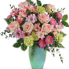Sweet and stylish, this blushing mix of soft pink roses with bright