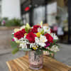 Enhance any space with our sophisticated flower arrangements in vases from Elegance