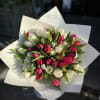 Brighten someone&rsquo;s day with our elegant wrapped tulips. Perfect for any occasion
