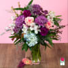 The Beretania Florist Amethyst bouquet is a stunning floral arrangement that features