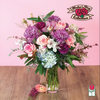 The Beretania Florist Amethyst bouquet is a stunning floral arrangement that features