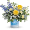 Like a stroll by the sea, this radiant yellow rose bouquet in