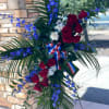 Honor an celebrate a life of service with our patriotic Funeral Spray.