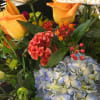  Hydrangea, Asiatic Lilies, Roses, Spider Mums, Min. Sunflowers(Seasonal) , Green Button