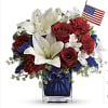 red white and blue flowers in a cube 