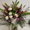 tall vase arrangement 
lavender , pinks , whites , greens 