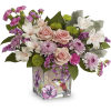 A sweet surprise, this feminine rose bouquet is perfectly presented in a