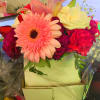 A nice and cute small arrangement with roses, lilies, carnations and baby&#039;s
