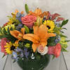 A bright and colorful arrangement is perfect for any occasion! Seasonal sunflowers