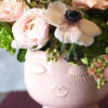Brighten your space with our enchanting Whimsical Floral arrangement, featuring a delightful