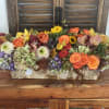 Long centerpiece for rectangular table, with beautiful fall flowers display  