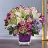 Hello, gorgeous! This bouquet includes purple hydrangea, light pink spray roses and
