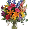 A rainbow of beauty for any occasion. Purple hydrangea, pink roses and