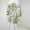 The Exquisite Tribute Standing Spray is an elegant display of sweet serenity.