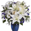Elevate any moment with Heavenly Blue Serenity, a stunning floral arrangement featuring