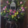 22" wreath using seasonal flowers to create a tranquil garden look for