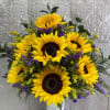 Beautiful tall floral arrangement simple but brilliant to brighten your special persons