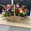 Large fireside basket with blooms of all shapes and colors.
Can be a
