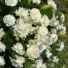 Honor a life beautifully lived with our Serenity Standing Spray, an elegant