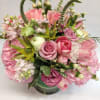 This sweet blush bouquet comes complete with roses, tulips, stock, snap dragonspray