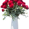 A stunning display of elegance, this arrangement features long-stemmed roses gracefully poised