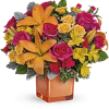 Vibrant bold summer colors made with in season mixed flowers lilies roses