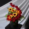 A modern take on roses and sunflowers. Arranged in a black hatbox