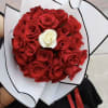 30 red roses and 1 white rose in the middle, wrapped in