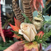AN ALTERNATIVE TO A CLASSIC BOUTONNIERE, THIS POCKET SQUARE IS ON TREND