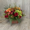 Modern cube arrangement with assorted fall flowers. 