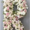 Completely custom flower letters or numbers. We need a 24 HOUR NOTICE.
