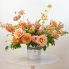 Let the pinks and peaches of this bespoke bouquet show your recipient