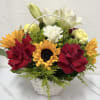 Buyer will receive a basket with red roses and sunflowers 