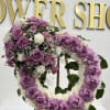Buyer will receive a Medium Crown With Purple Roses