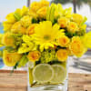 Brighten up their day with this sweet arrangement of yellow roses, lilies