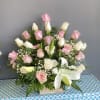 Pink and white roses with Lilly arrangement
