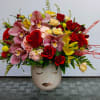 Order this stunning fresh floral arrangement in ceramic keepsake container, with roses
