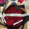 24 red roses with a graduation hat, and a custom ribbon