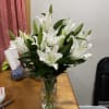 A large Lilly arrangement in a vase