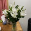 A large Lilly arrangement in a vase