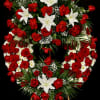 This is a stunning heart-shaped floral wreath, symbolizing love, respect, and remembrance.