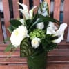Modern, cube arrangement with a exquisite mix of white callas, green hydrangeas
